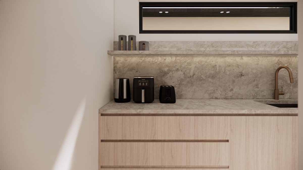 Kitchen with stone splashback and timber drawer fronts